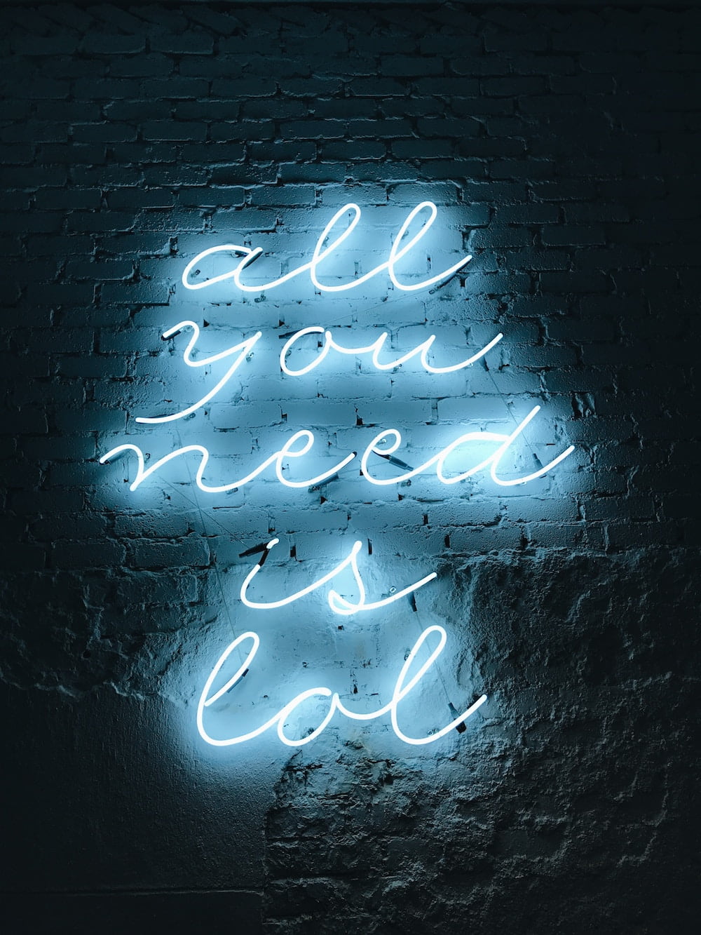 Sign saying all you need is lol