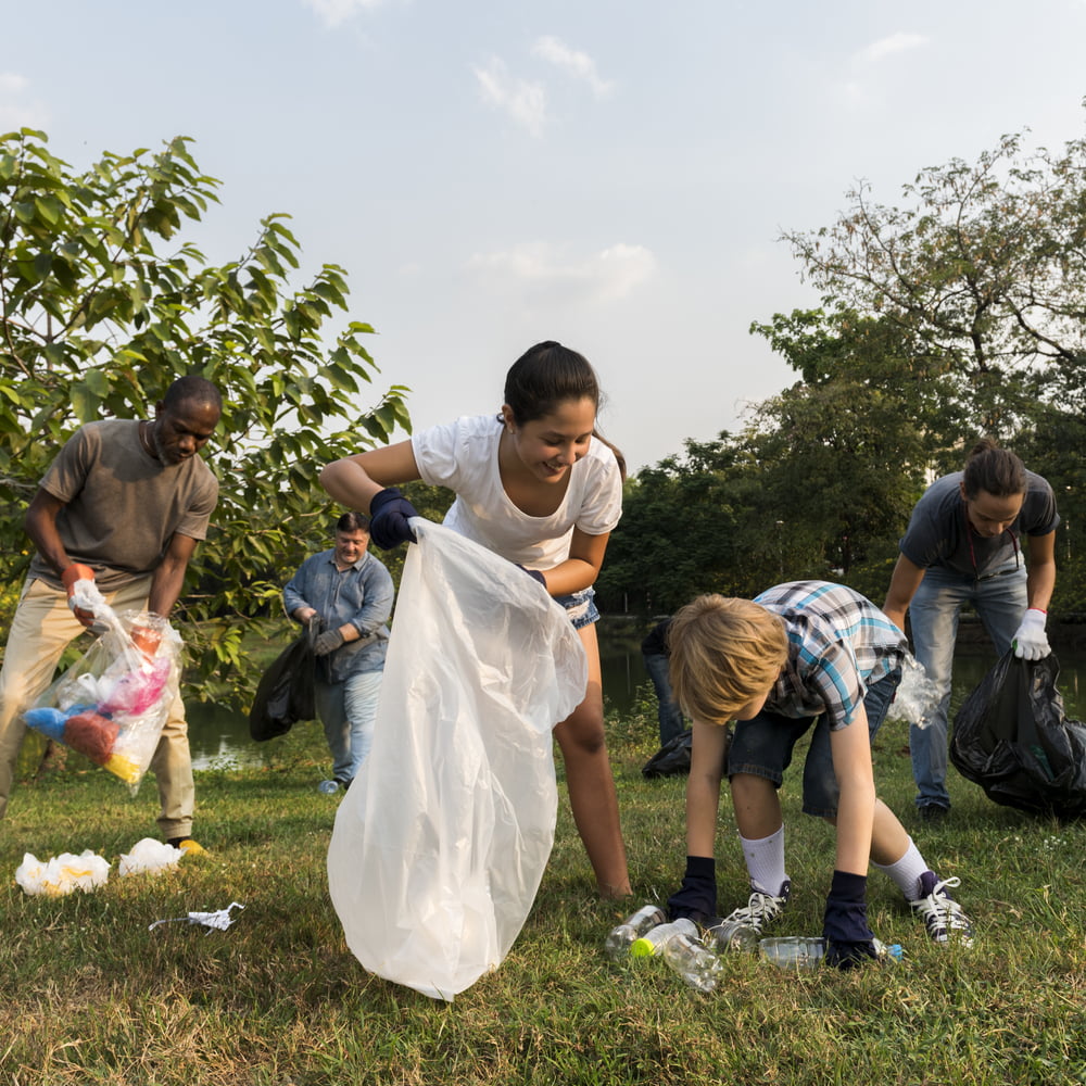 people picking up rubbish