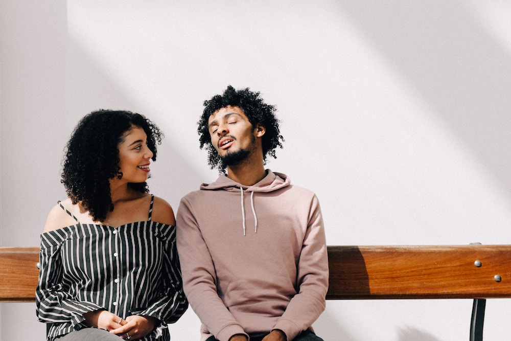 couple sat on bench