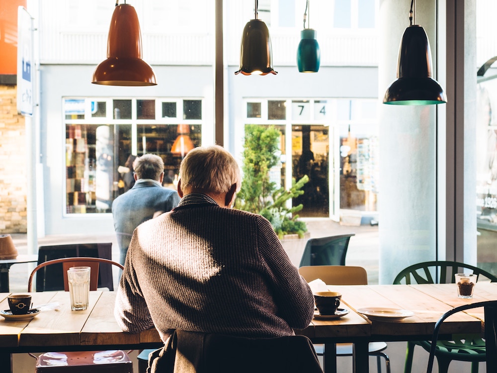 Old man in cafe