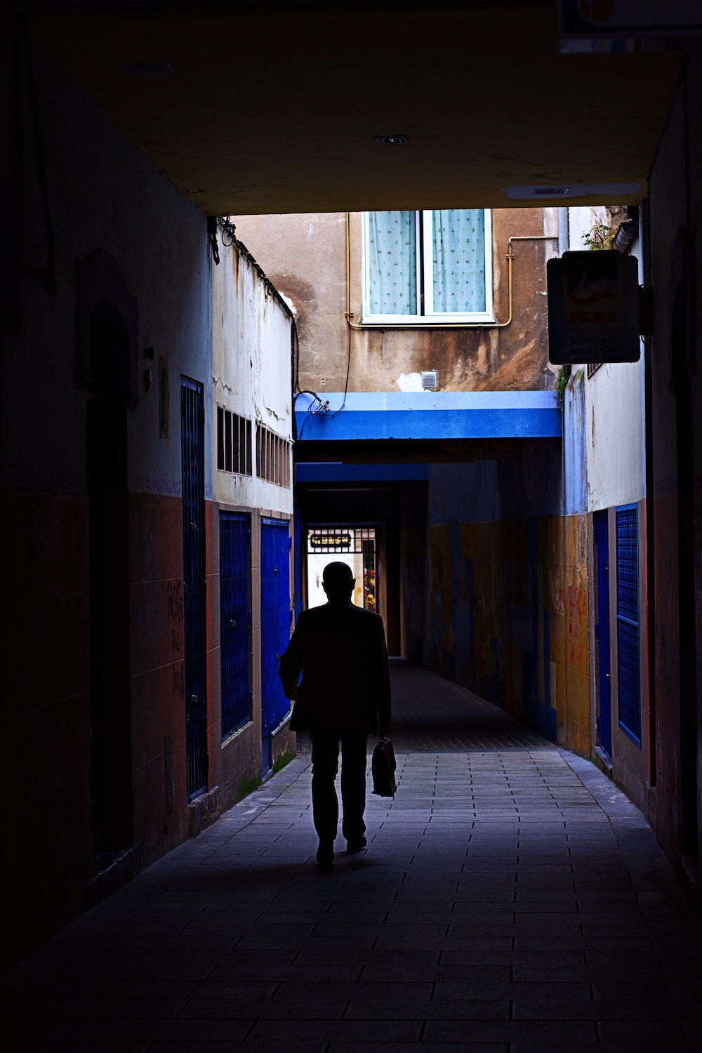 man walking in street
