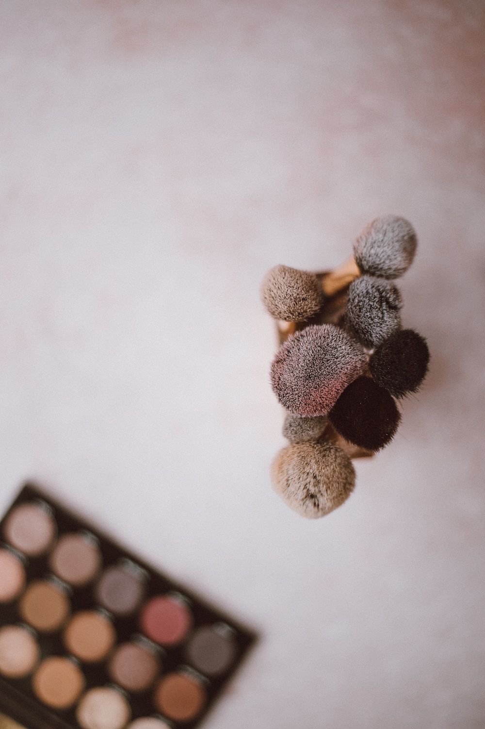 make up brushes in a pot
