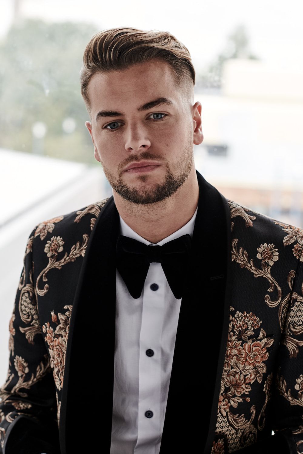 chris hughes wearing a thoughtful expression