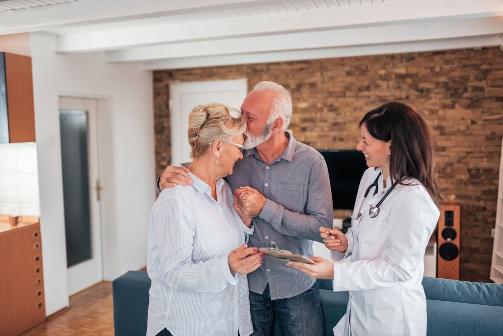 Doctor giving patients good news