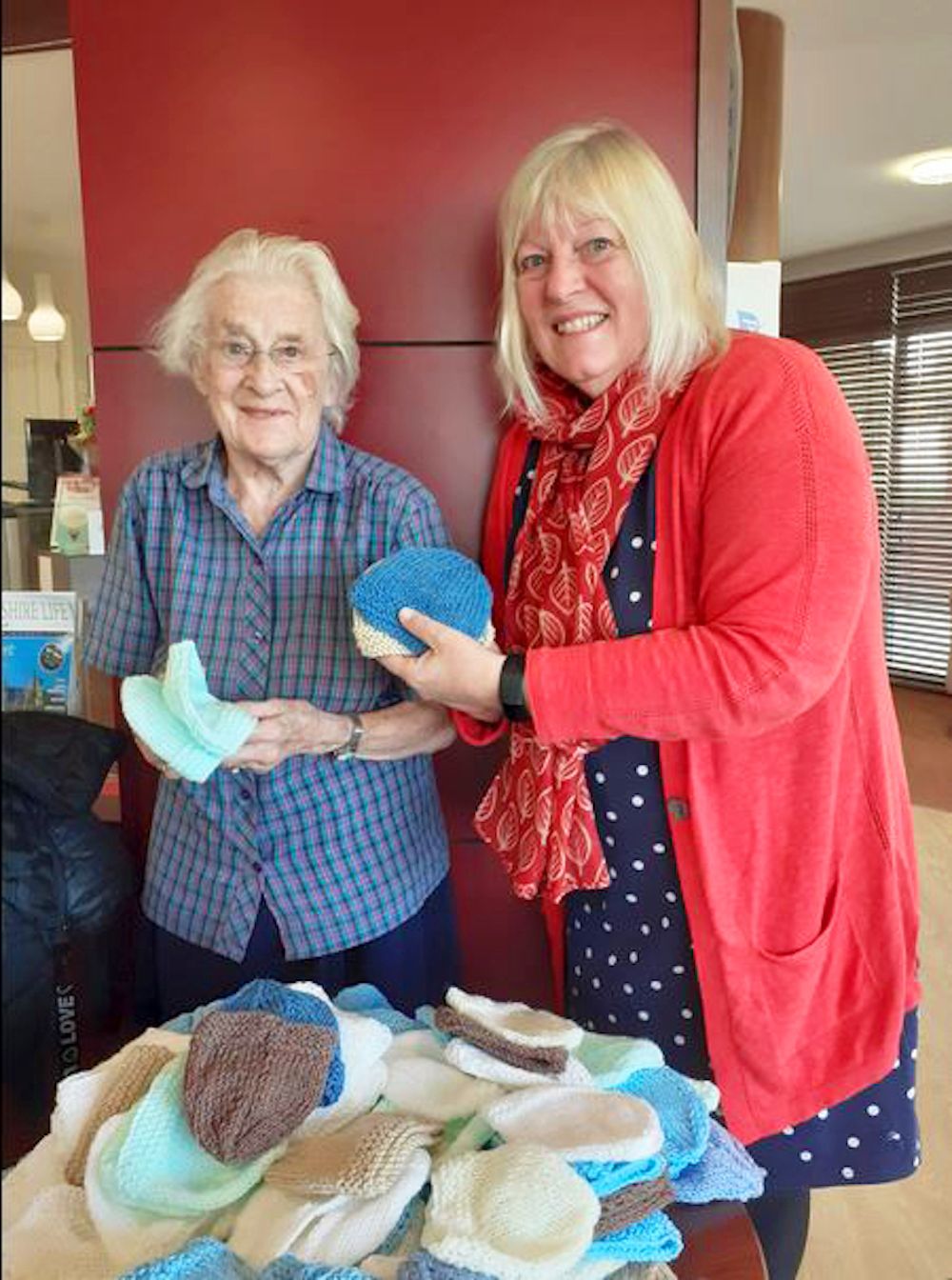 Joan-and-some-of-her-knitted-hats-2--1-