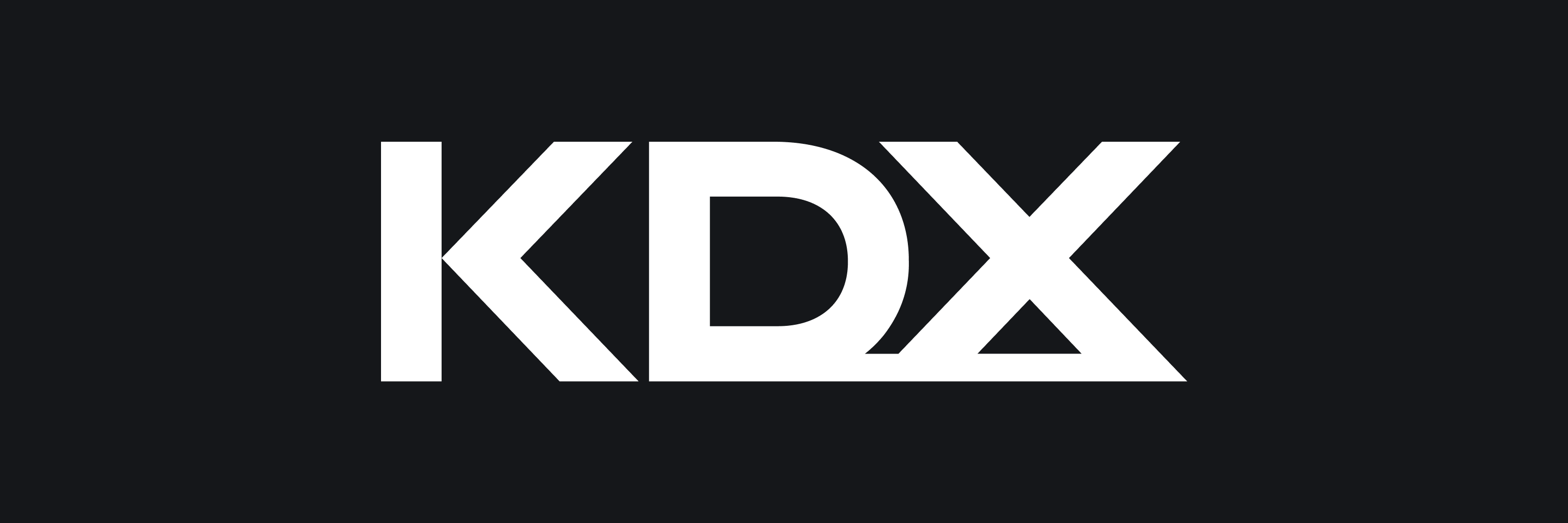 Kenedix (KDX) logo – bold white “KDX” text on a black background.