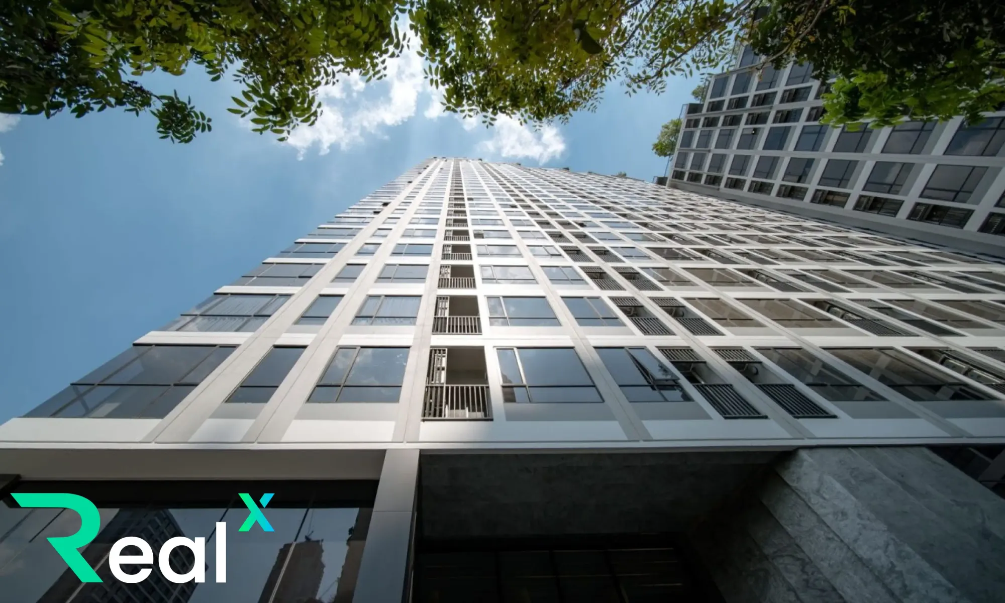 Bangkok condominium tower — RealX real estate tokenization and rental income sharing