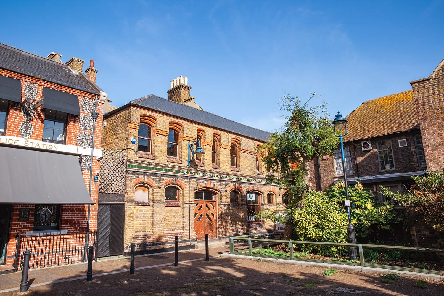 an old warehouse building and courtyard