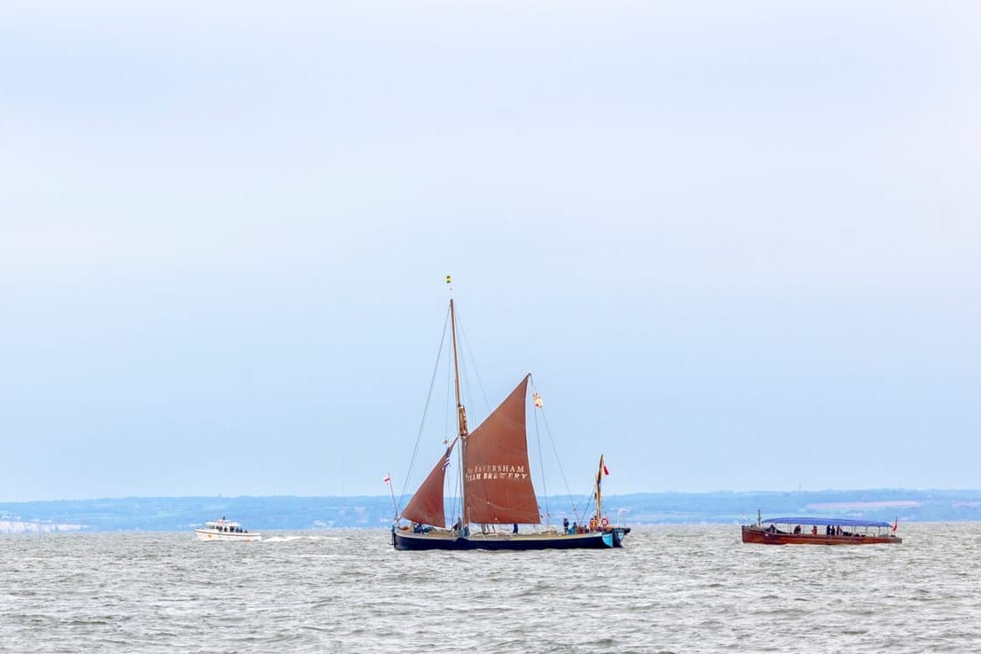 Three boats on the channel near the White Cliffs of Dover