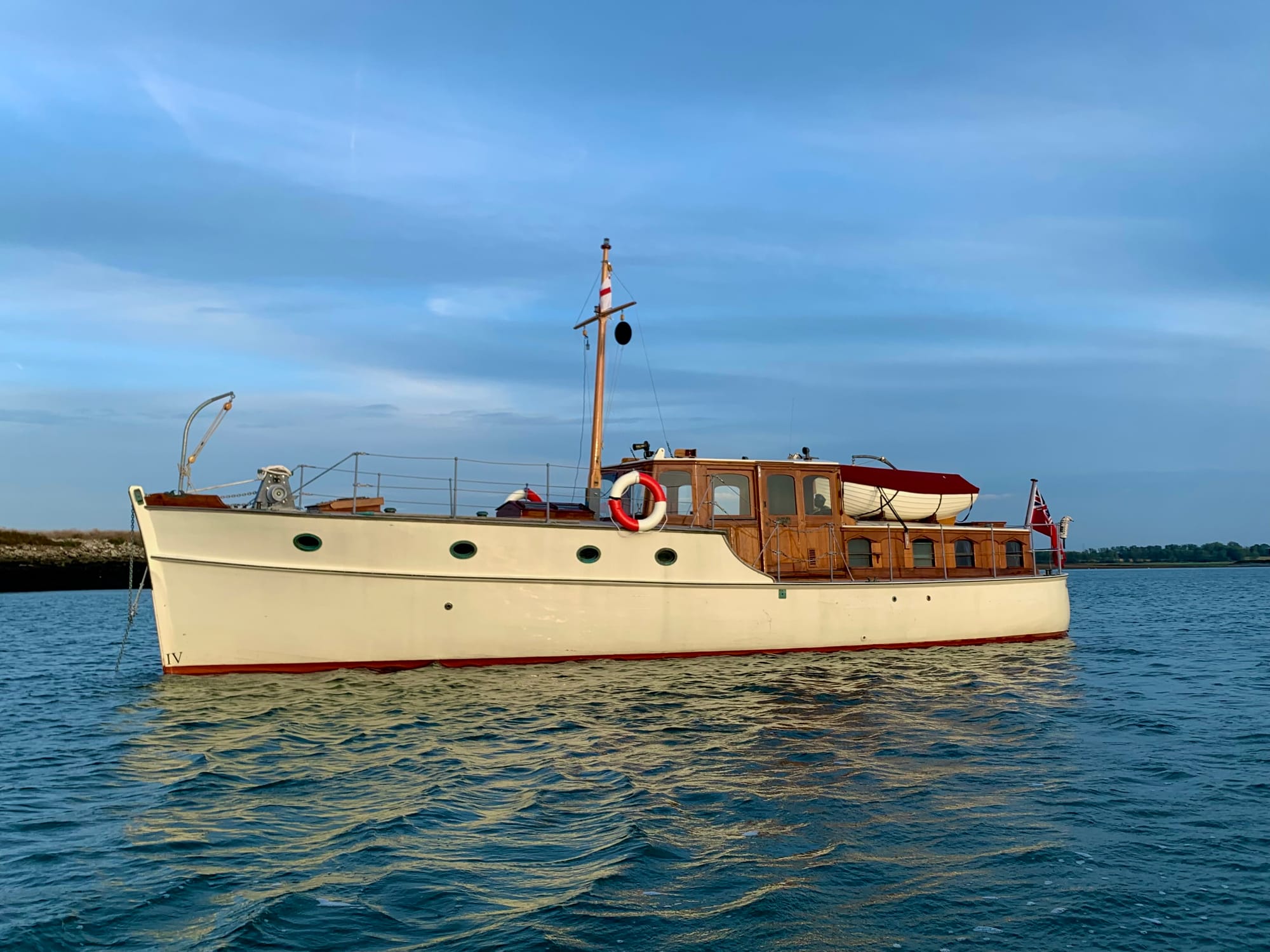 A vintage motor yacht on the water