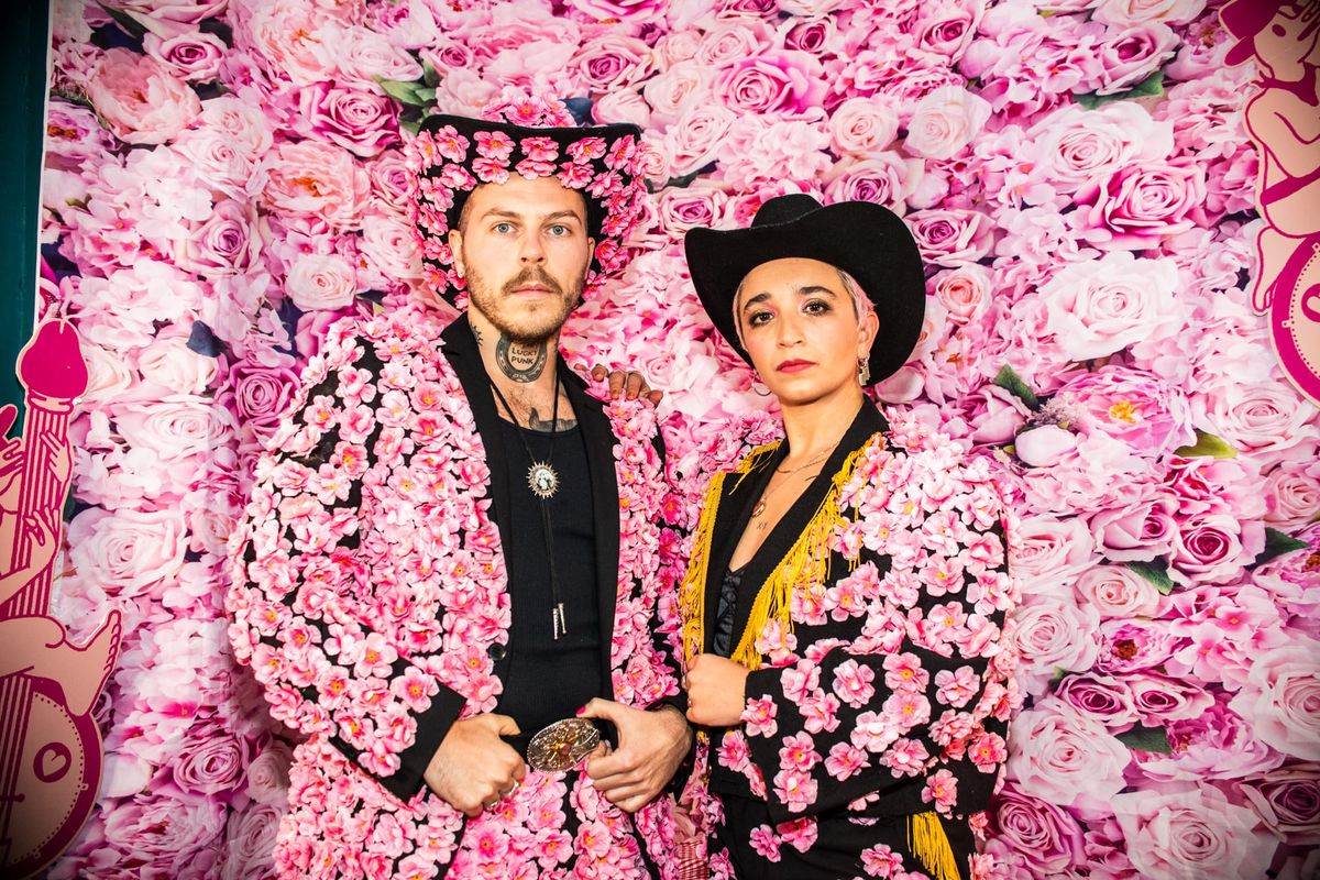 Queer Cuntry founders Lennie and Ray from pink suits. Photo: Queer Cuntry/Stephen Daly