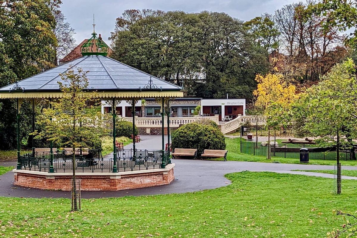 A bandstand in a well kept park