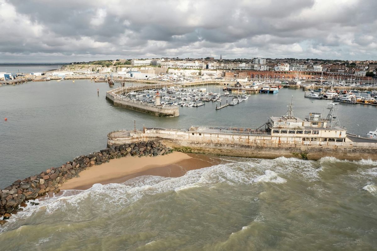 A view of a harbour looking from the sea inland