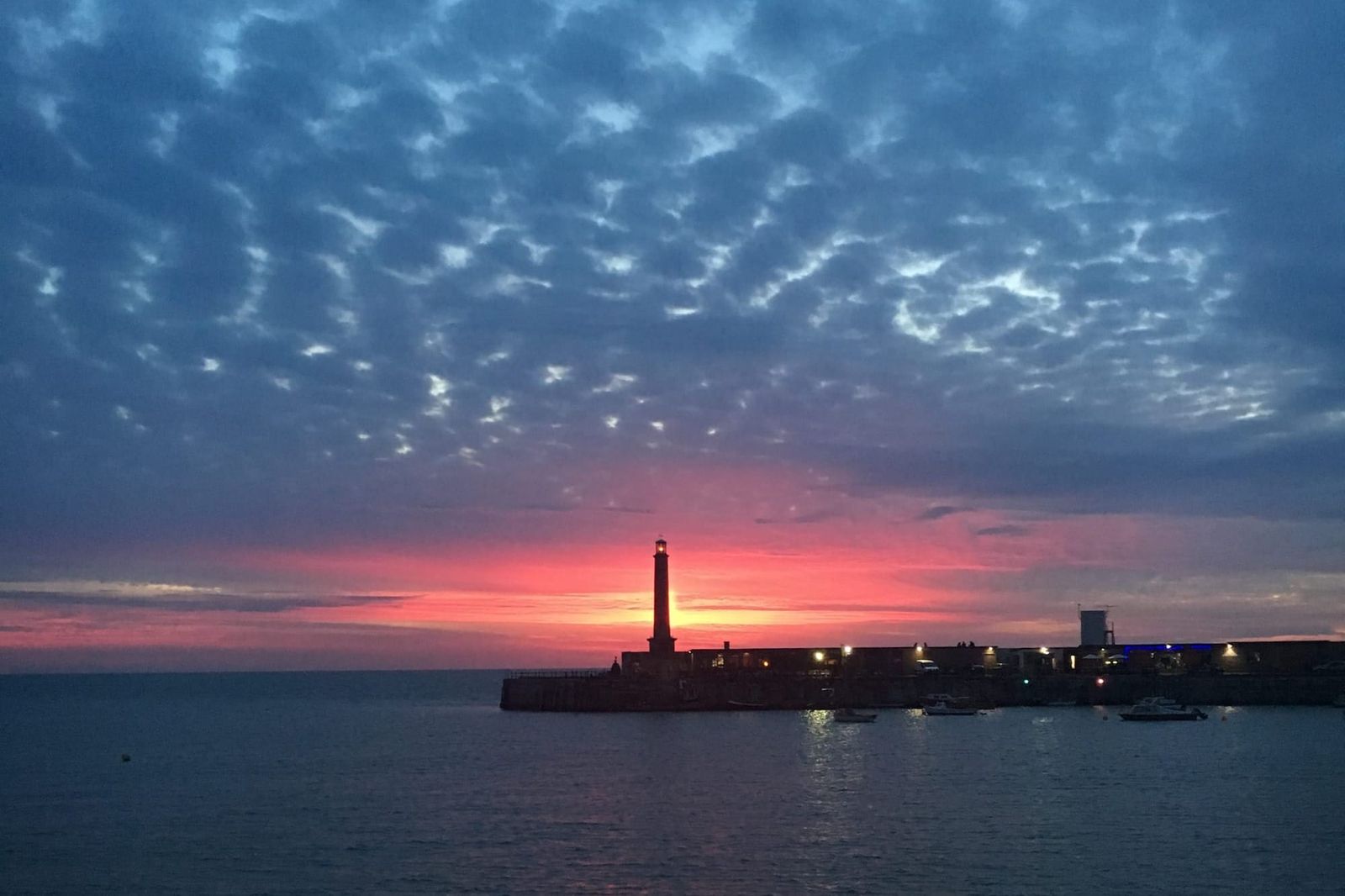 A sunset over Margate's Harbour Arm