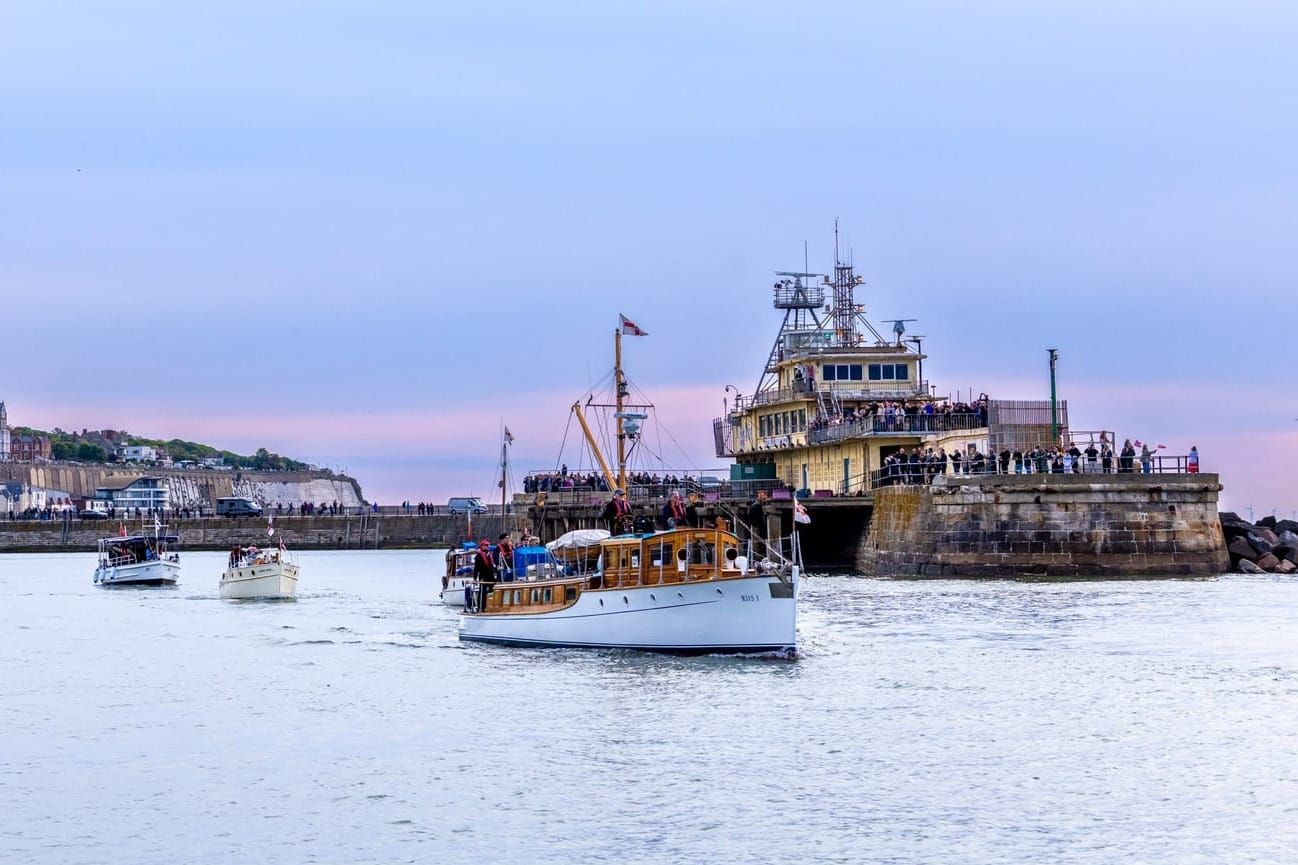 Vintage boat on Ramsgate harbour at sunrise.