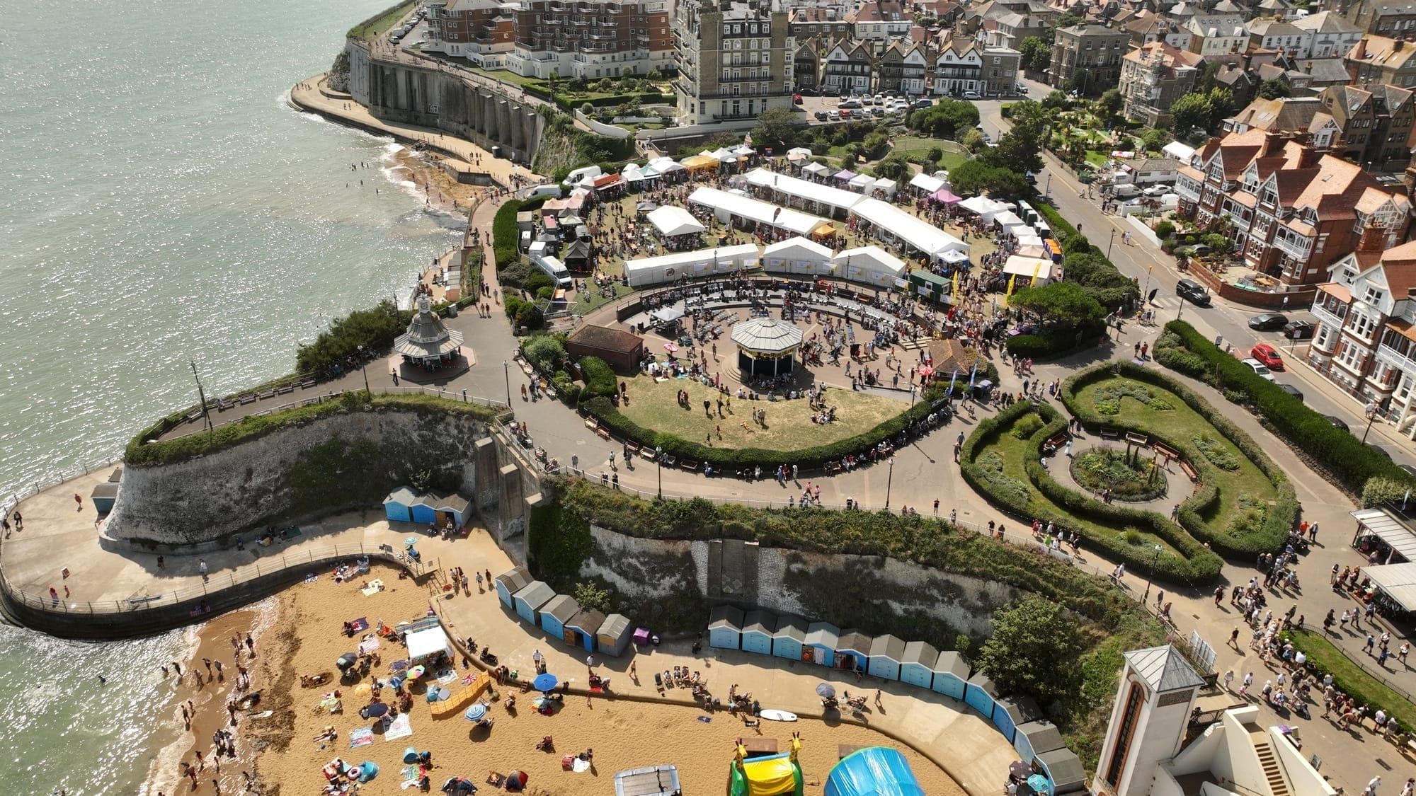 An arial shot of Broadstairs Folk Week, showing the markets section, the band stand and the beach