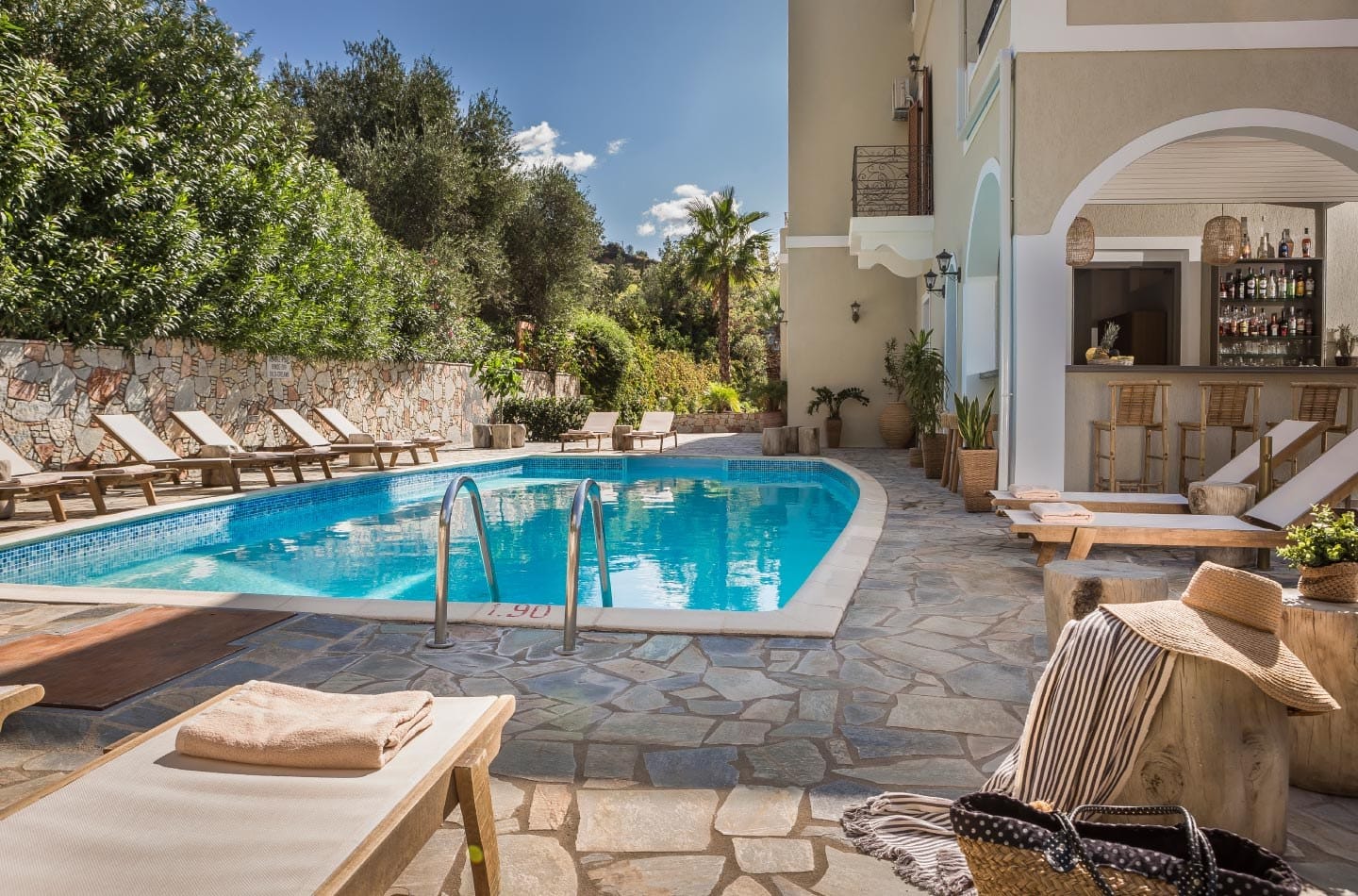 Outdoor pool with sunbeds at La Signora Hotel, Kefalonia (from the property's own photo gallery)