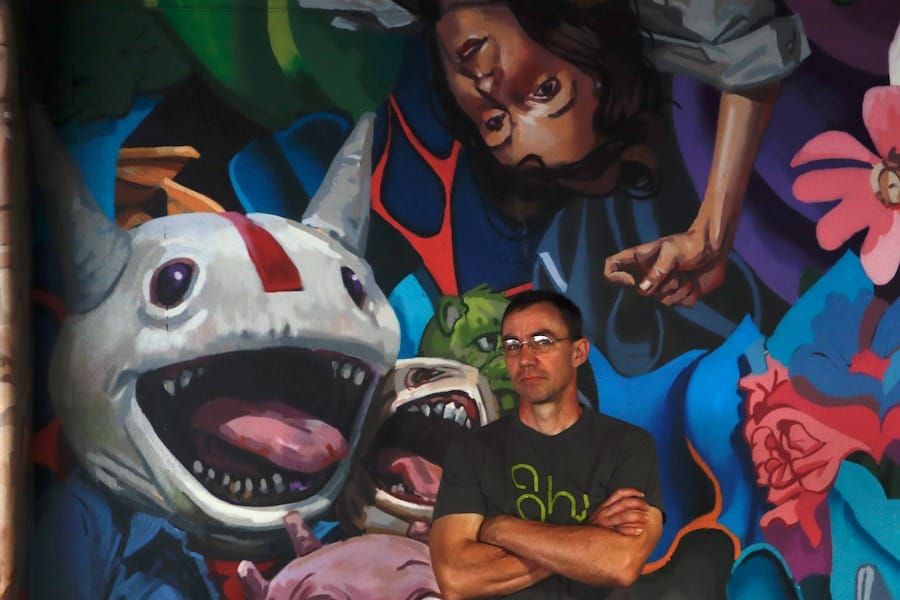 New Mural Showcases Wonderful Woes of Technology in Grove Street Parking Garage