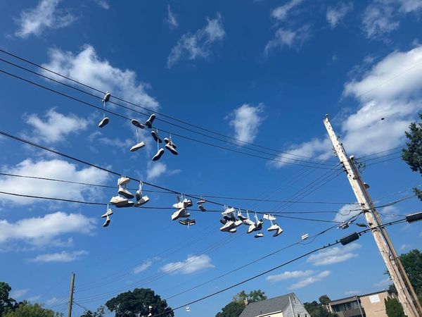 Shoes on a Wire: A Grumpy Homeowner’s Quest for Answers