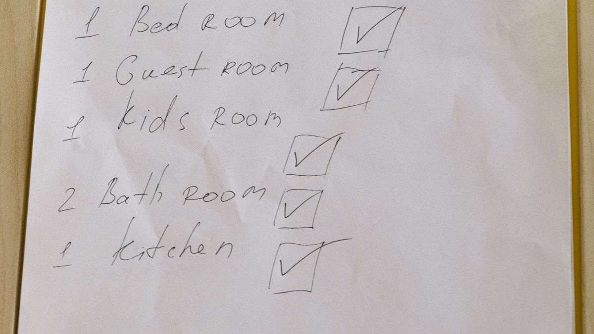 A checklist page clipped to a white clipboard.