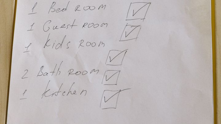 A checklist page clipped to a white clipboard.