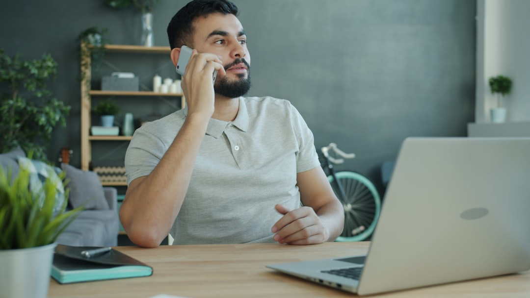 person using smartphone making a call