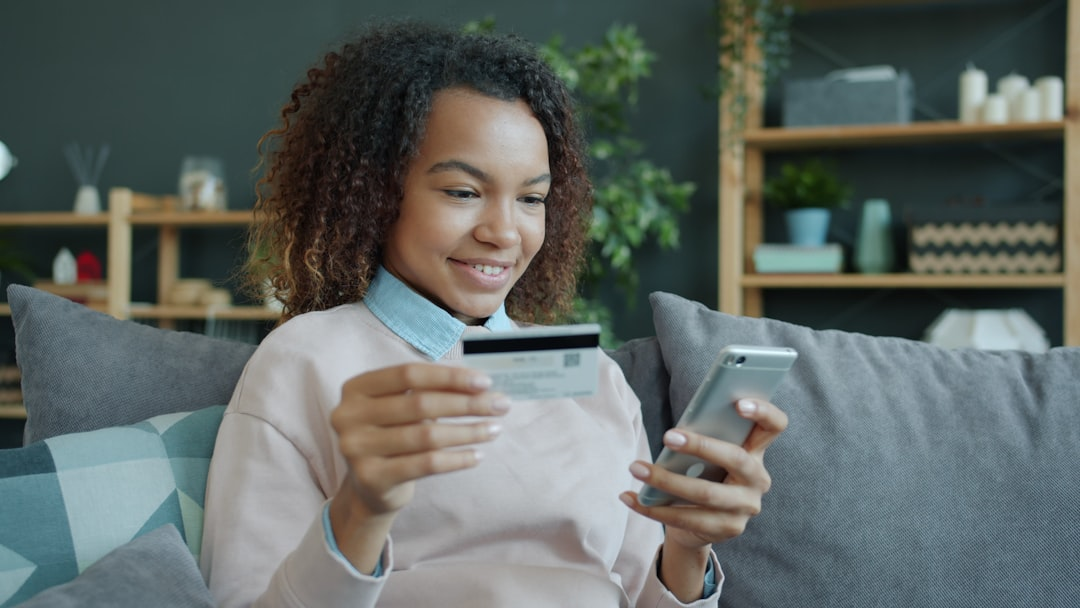 person using smartphone shopping online