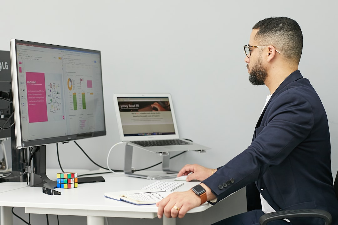 laptop with analytics dashboard and charts