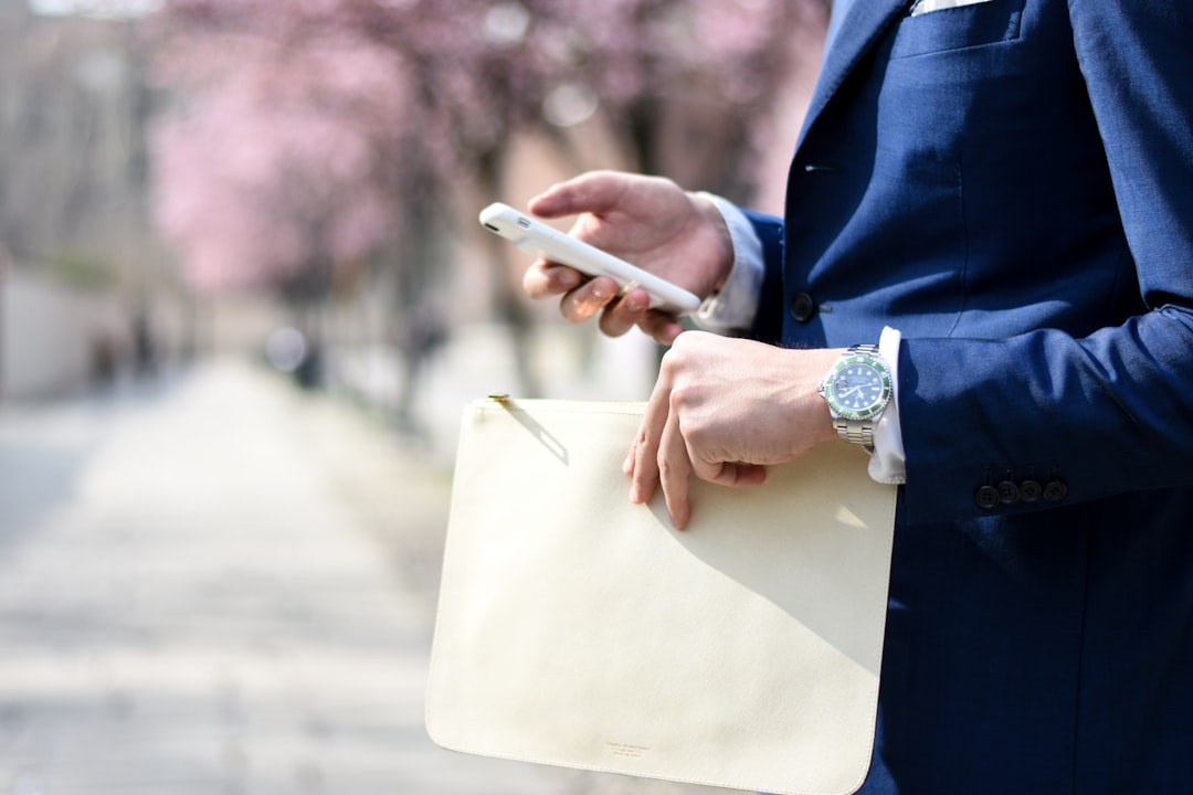 smartphone in hand business