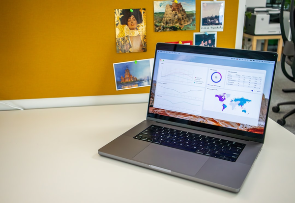 online course creation laptop workspace
