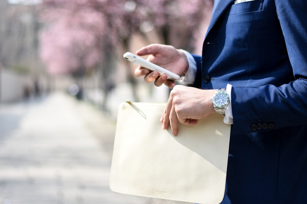 smartphone in hand business