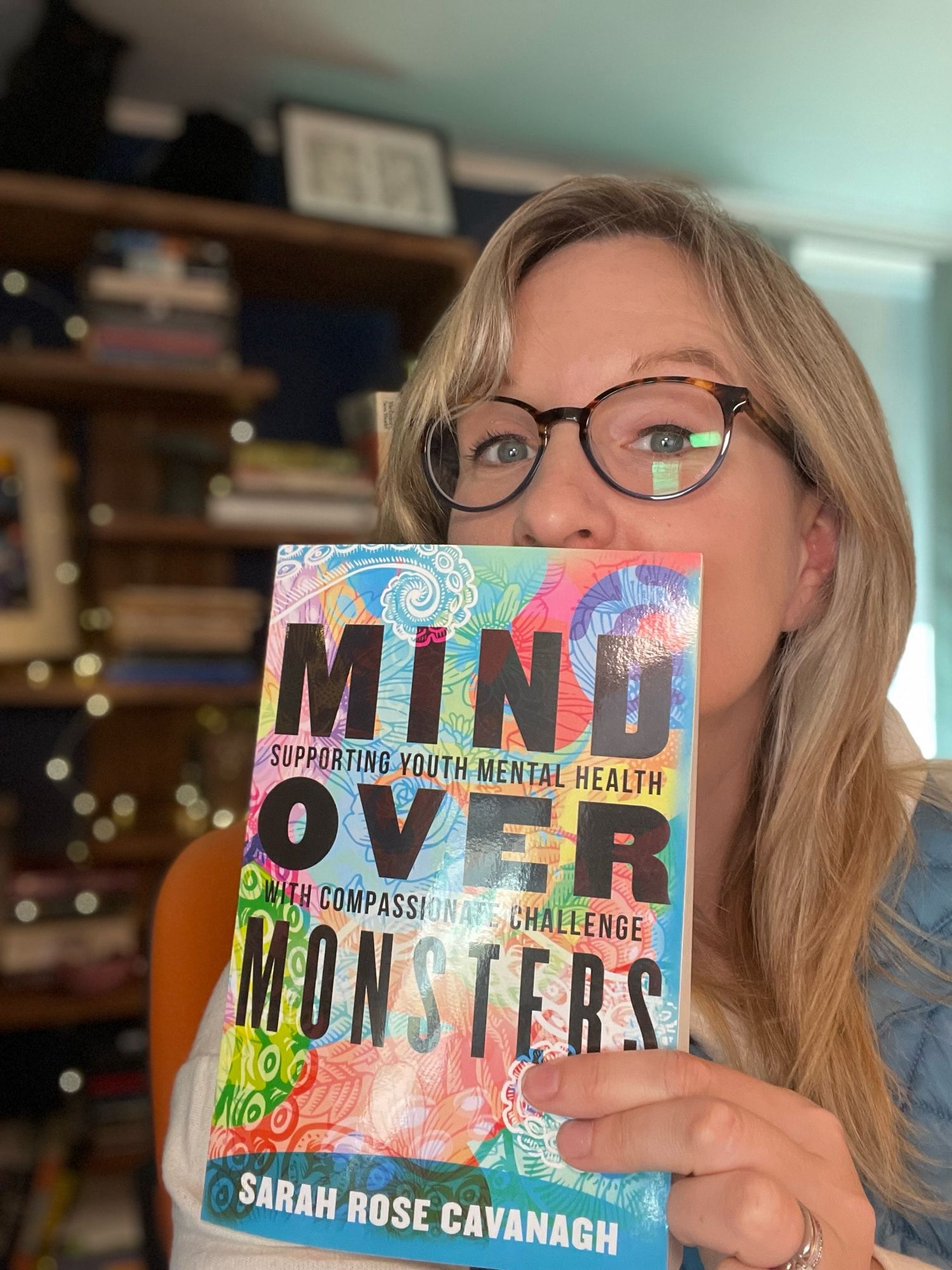 May be an image of 1 person and text that says 'MINU OVER SUPPORTING SUOUTMENTAL HEALTH COMPASSION MONSTERS CHALLENGE SARAH ROSE CAVANAGH'