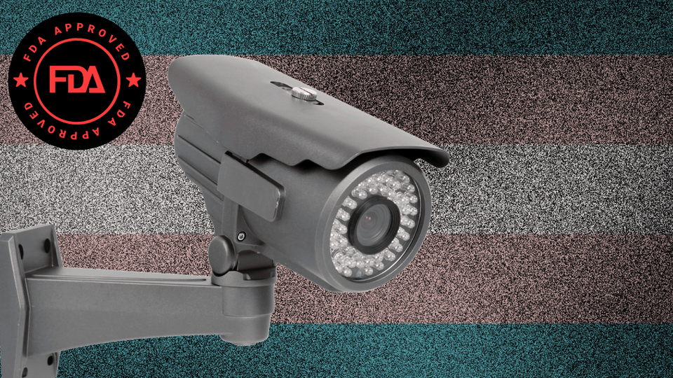 a grainy faded trans flag with an fda approved red/black logo and a giant modern surveillance camera superimposed over it.