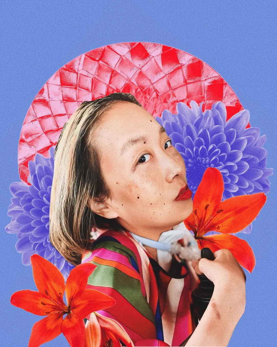 Digital portrait featuring a photo of Asian American woman with honey blonde hair. She is in a wheelchair and there is a tracheostomy at her neck connected to a ventilator. She is wearing a silky multicolored shirt and a bold red lip color. She is looking intently at the camera with the heat of a thousand suns. Behind her are red and purple flowers with a red circle in the background framing her face like a warm sun. The background of the portrait is purple.
