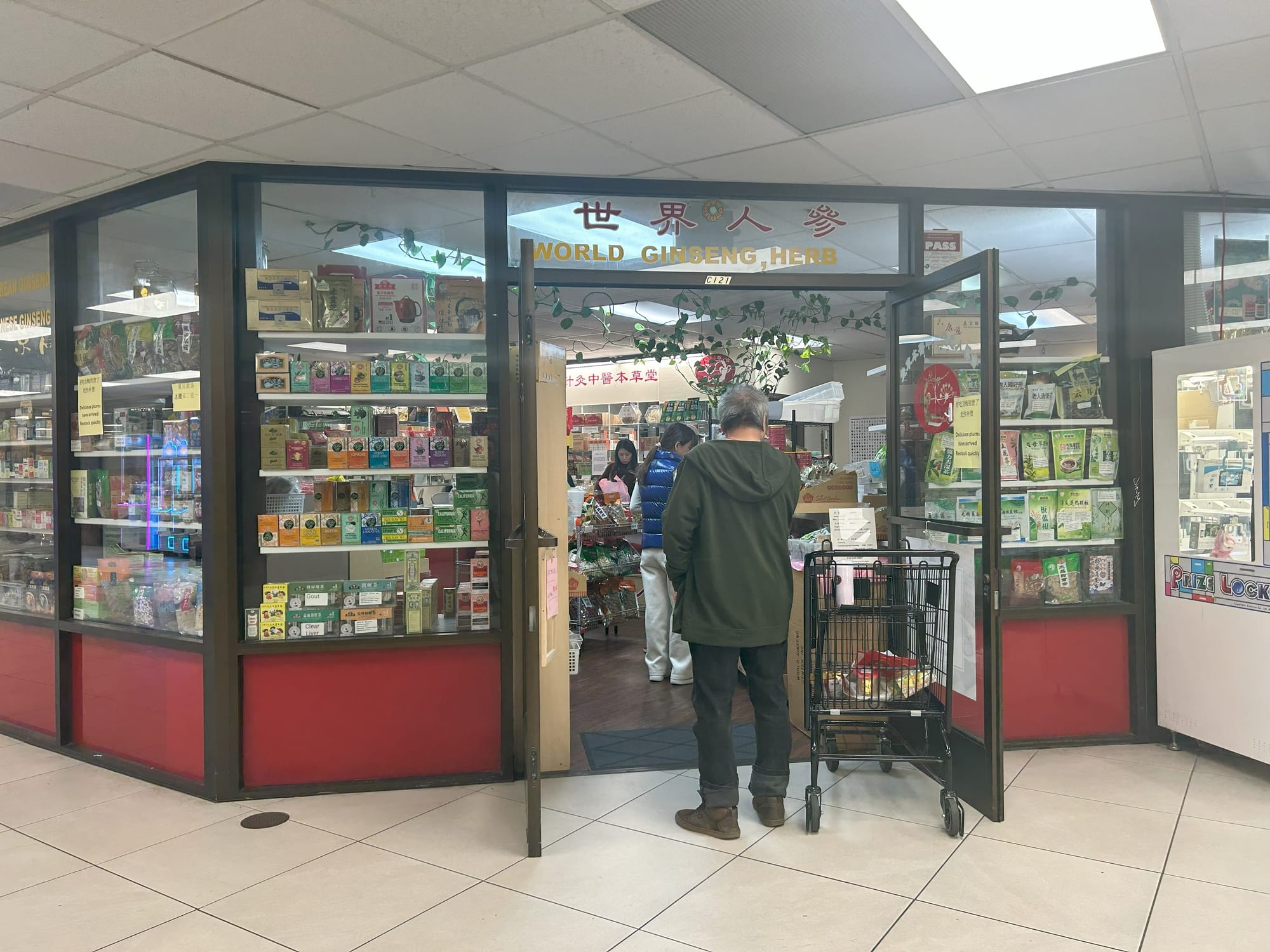 A storefront inside of a mall selling Chinese Traditional Medicine items.