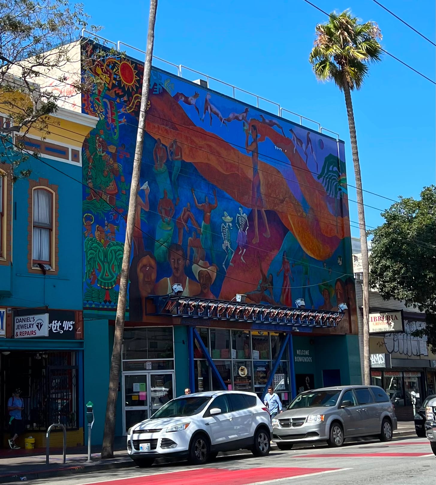 the facade of a building in san francisco with a colorful mural