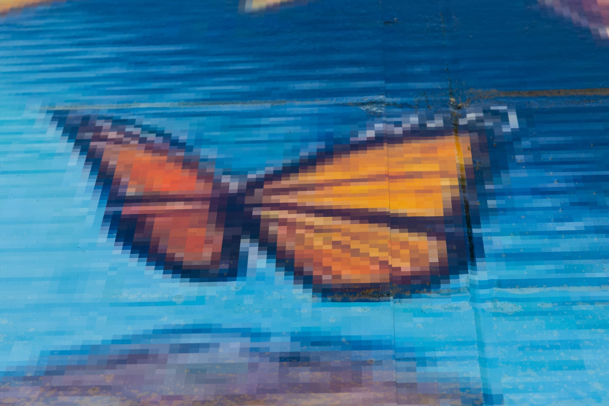A pixelated butterfly.