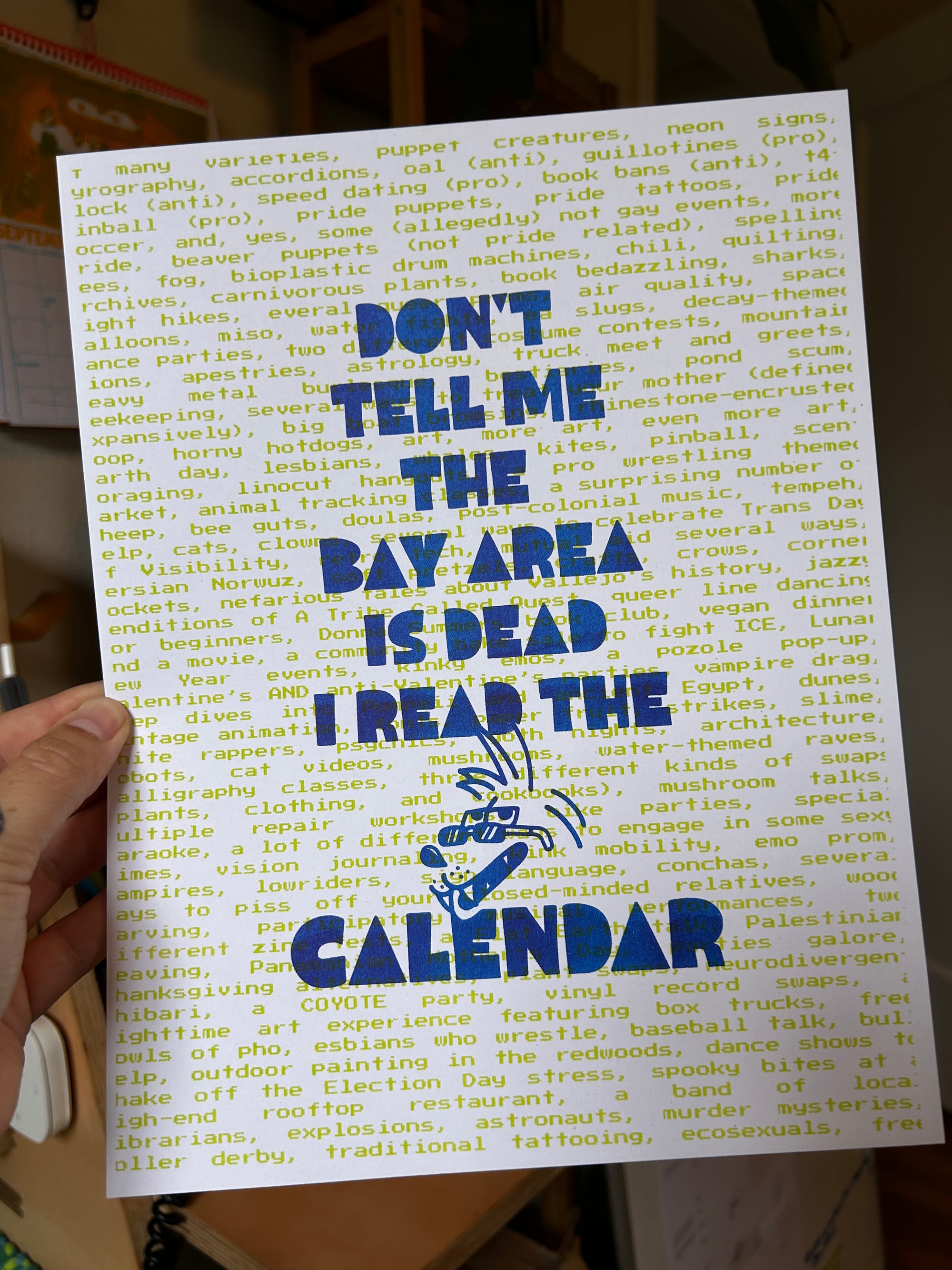 A printed page with a background of lime green text with wall to wall event types like "lesbians, ecosexuals, traditional tatooing," and more and blue text on top that says "Don't tell me the bay area is dead I read the coyote calendar"