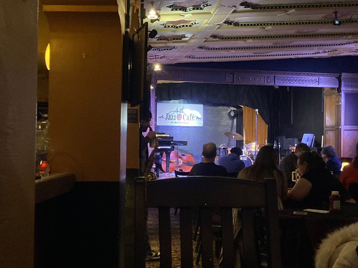 Go by yourself. (Like, to Aretha's Jazz Cafe, for example.)