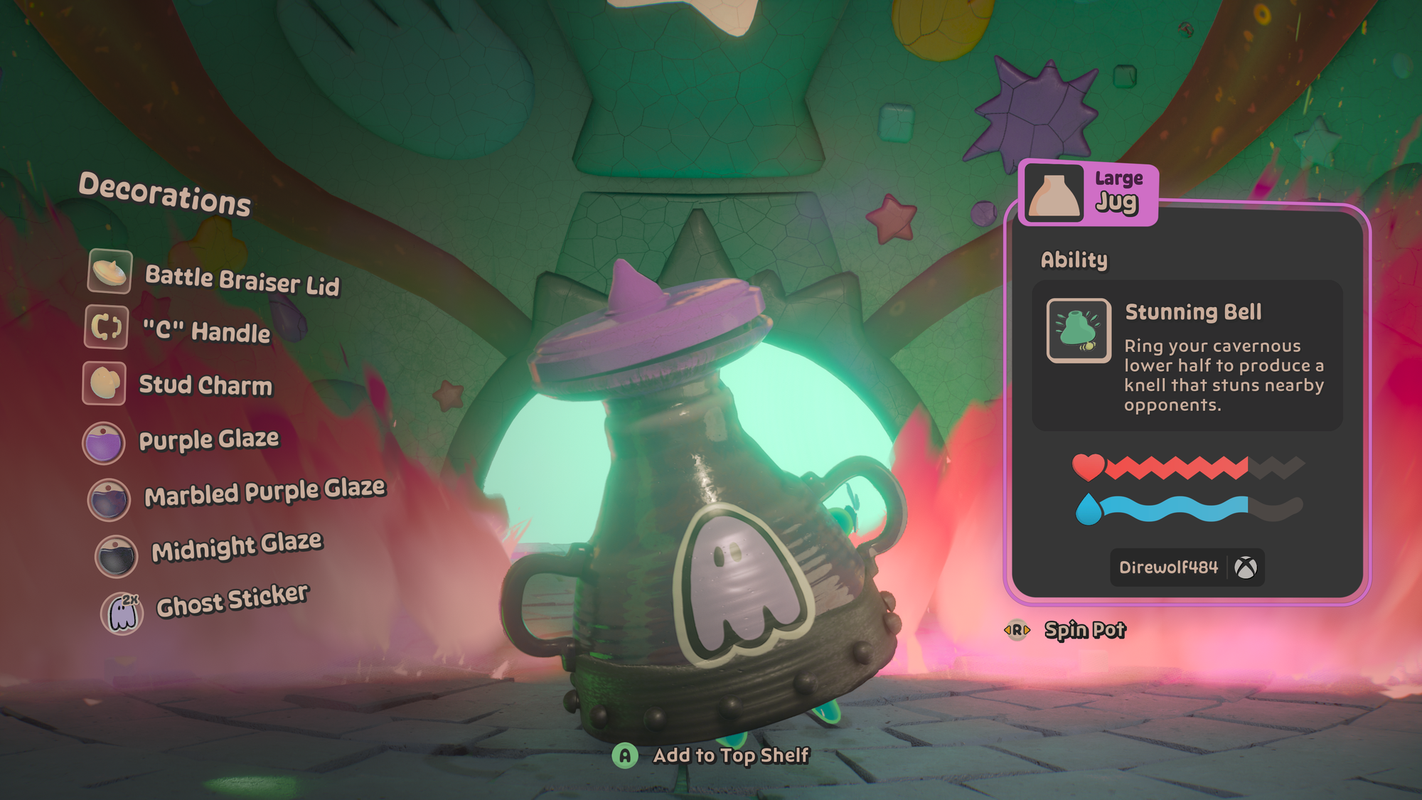 A purple and black jug with a sticker of a ghost