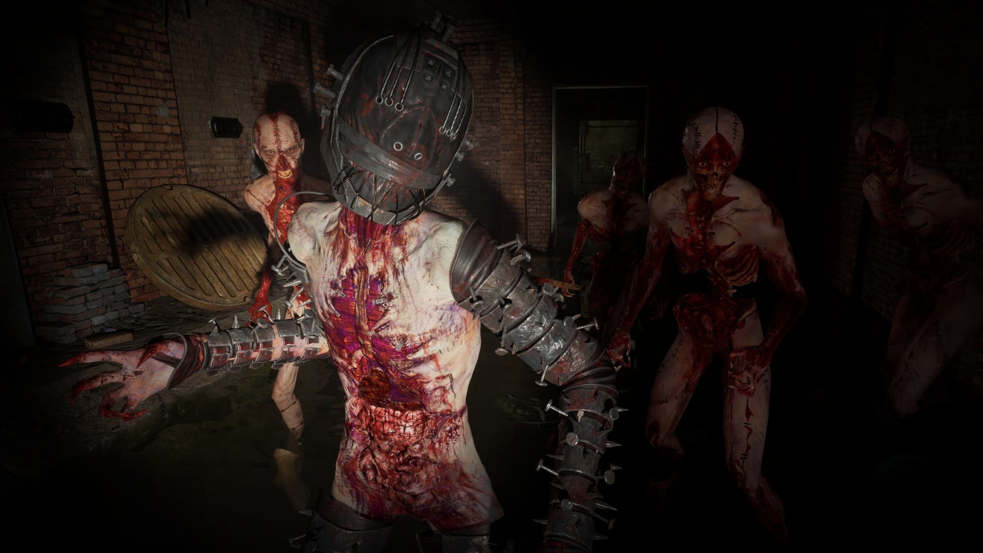 A group of bloody cultists approaching in Clive Barker's Hellraiser: Revival.