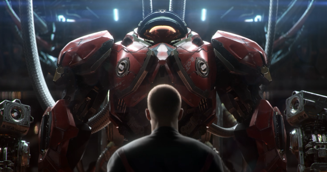 A man looking at a suit of marine armor in StarCraft