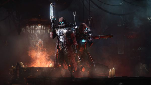 Two cyborg Skitarii soldiers holding guns with a fiery foundry in the back in Warhammer 40,000: Darktide