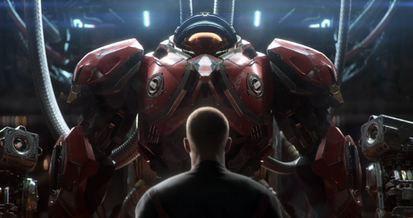 A man looking at a suit of marine armor in StarCraft