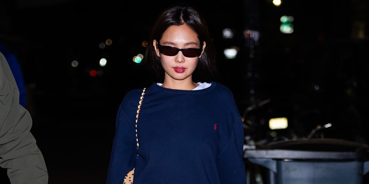 Jennie’s Off-Duty Uniform Includes Vintage Pinstripe Jeans and a Spotted Chanel Handbag
