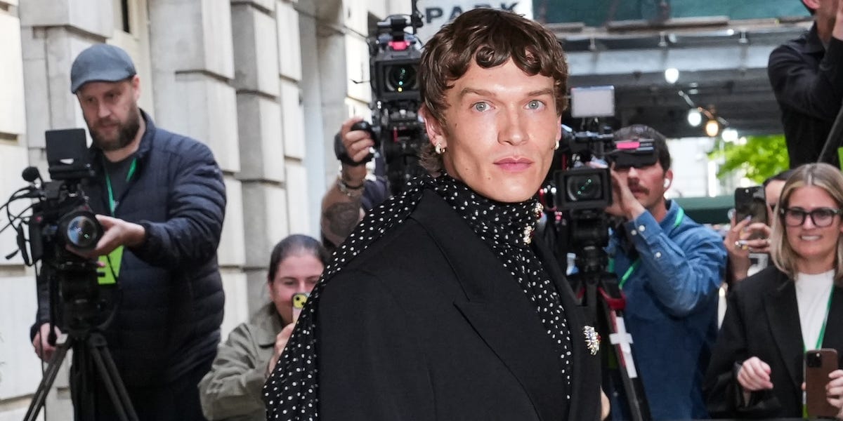 Connor Storrie’s Polka-Dot Top Cascades All the Way Down to the Red Carpet