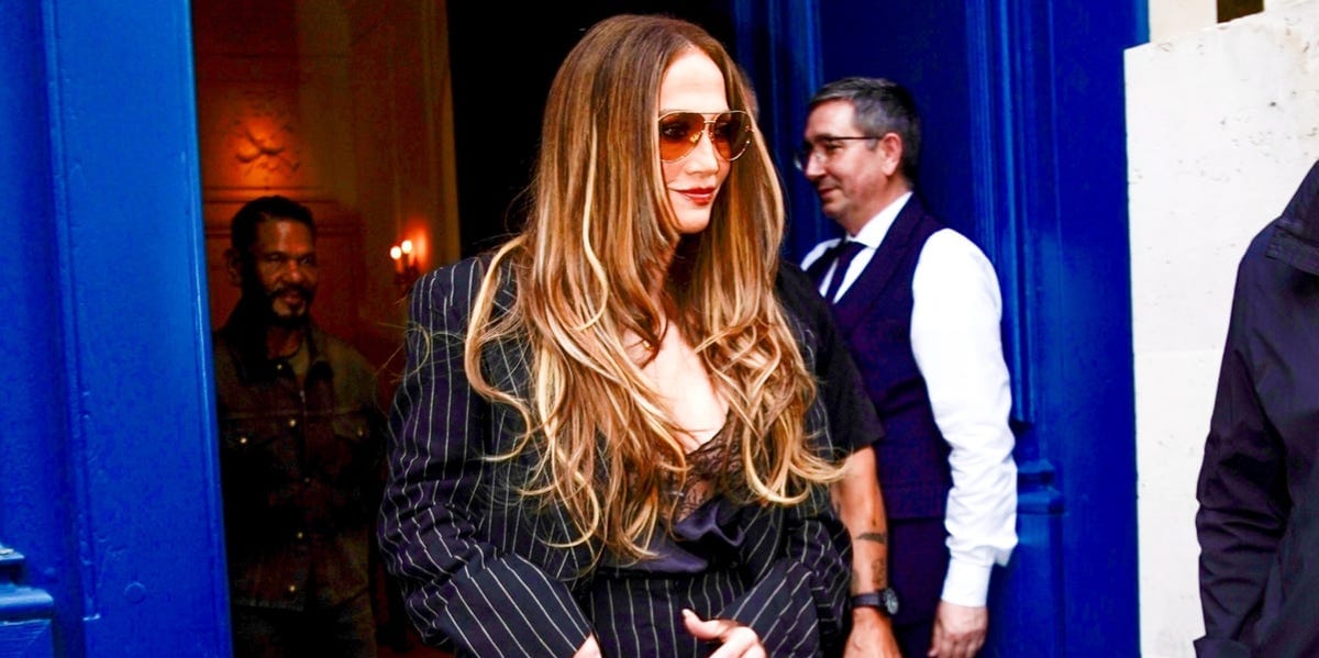 Jennifer Lopez Pairs Her Oversize Striped Suit With a Royal-Blue Kelly Bag