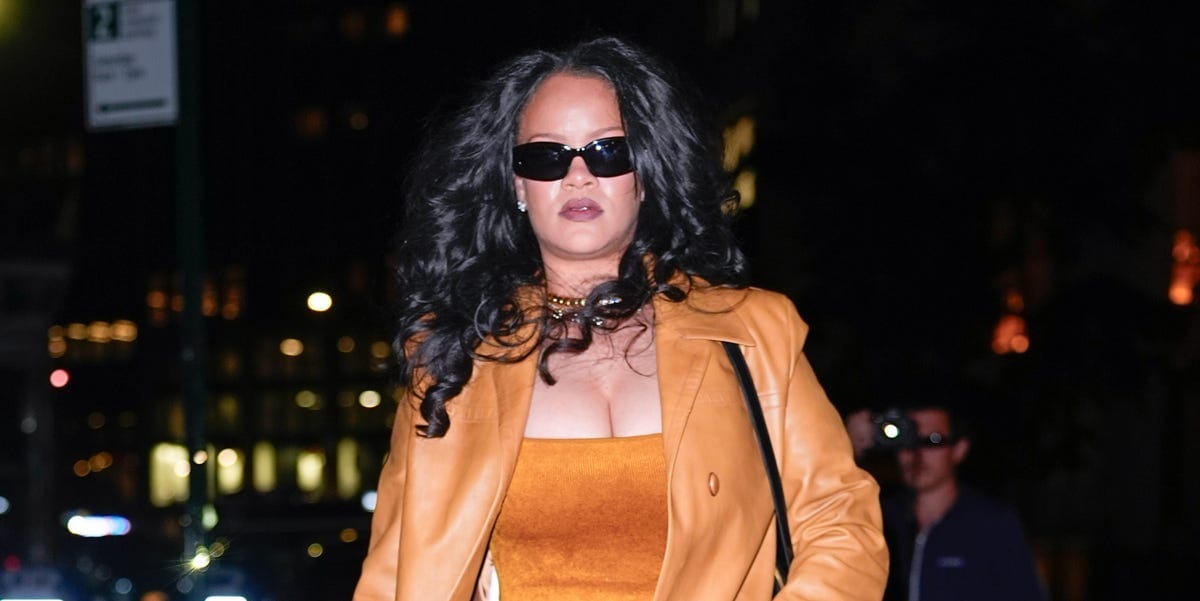Rihanna Takes an All-Mustard Approach to Tonal Dressing With a Leather Coat and Velvet Dress