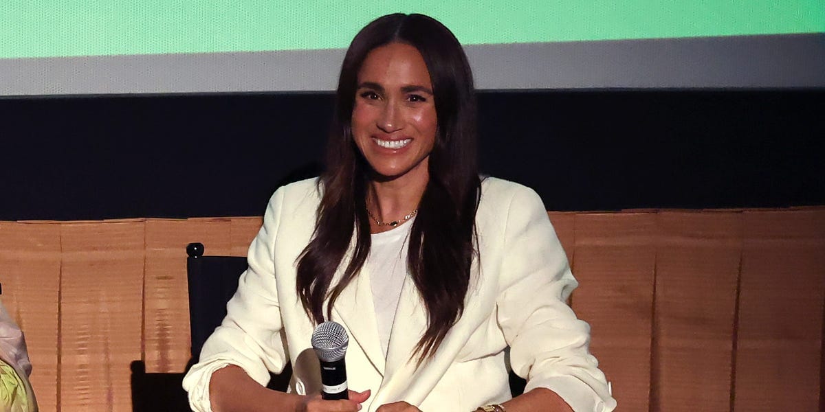 Duchess Meghan Attends a Screening of <i><em>Cookie Queens </em></i>in a Cream Suit Set With Quietly Luxurious Sandals