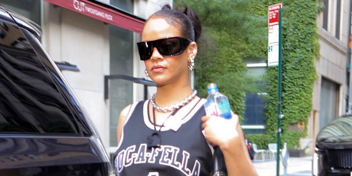 Rihanna Sneaks Into Jay-Z’s Yankee Stadium Concert in a Meaningful Jersey and Flip-Flops